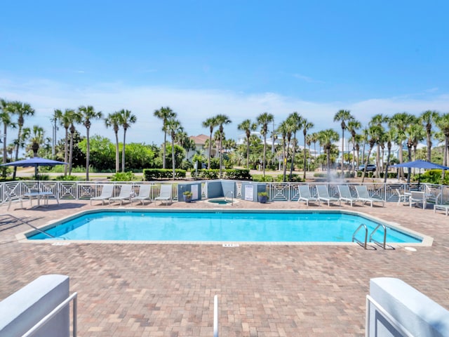 pool with a patio