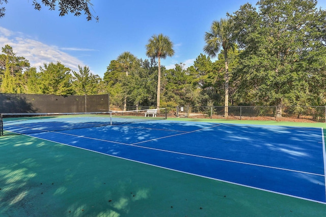 view of sport court with fence