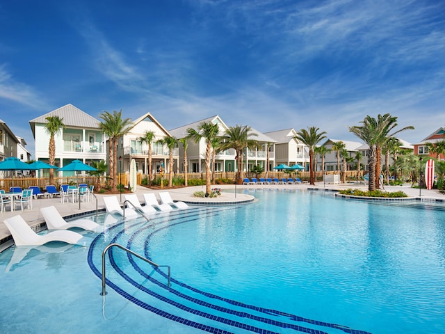 view of swimming pool featuring a patio