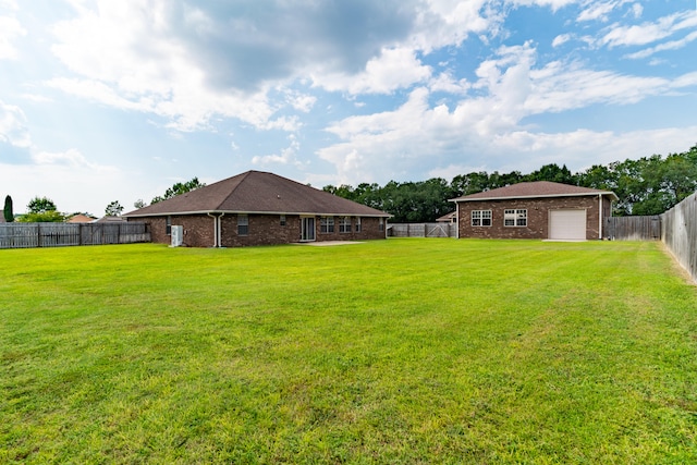 view of yard with a garage