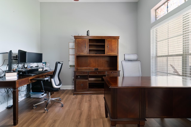 office space with light hardwood / wood-style floors