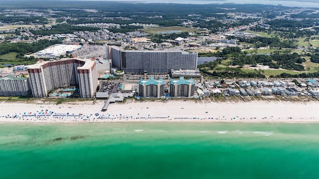 drone / aerial view with a view of city, a beach view, and a water view