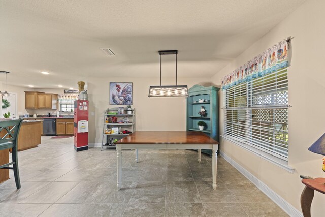 dining room featuring light tile patterned floors