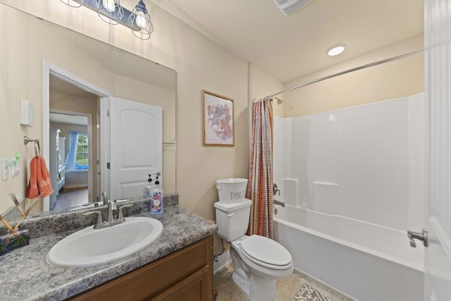 full bathroom featuring tile patterned flooring, toilet, shower / tub combo with curtain, and vanity