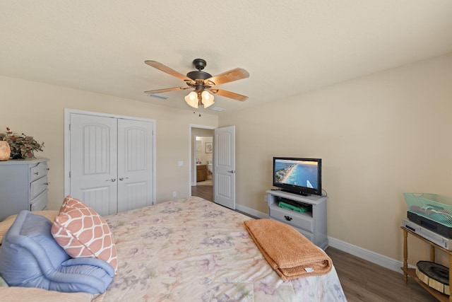 bedroom featuring a closet, ceiling fan, and hardwood / wood-style floors