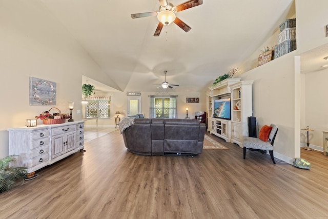 living room featuring hardwood / wood-style flooring and ceiling fan