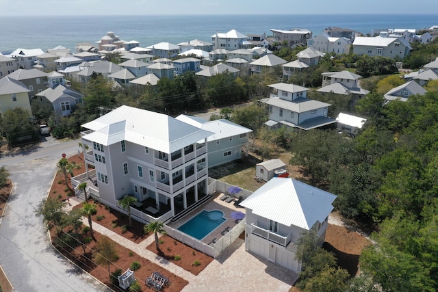 drone / aerial view with a water view