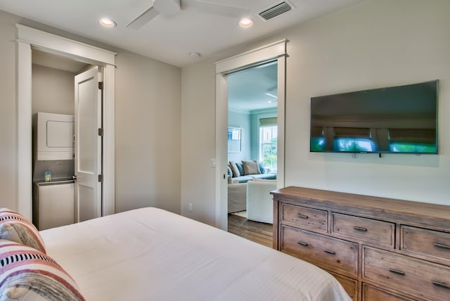 bedroom featuring ceiling fan and dark hardwood / wood-style floors