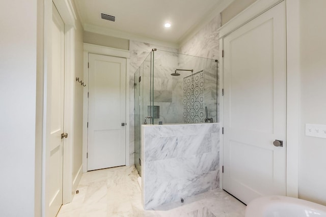 bathroom featuring a shower with door