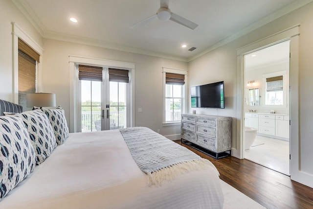 bedroom featuring french doors, crown molding, access to exterior, ensuite bathroom, and dark hardwood / wood-style floors