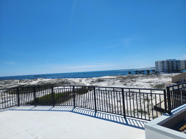 exterior space with a view of the beach and a water view