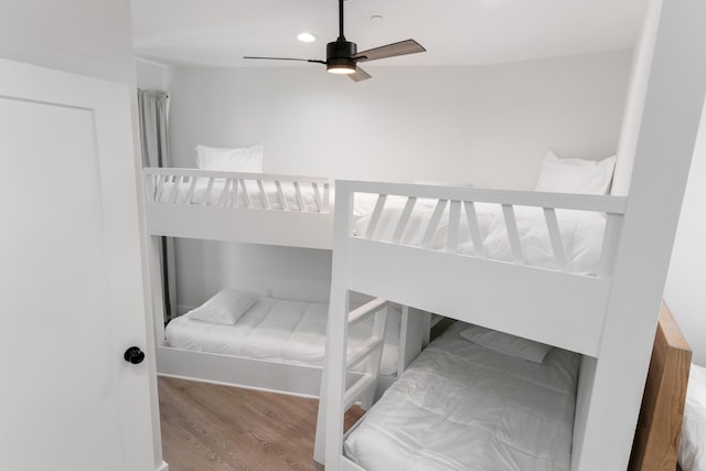 bedroom featuring hardwood / wood-style floors and ceiling fan