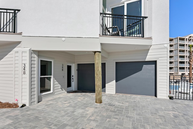 entrance to property featuring a garage