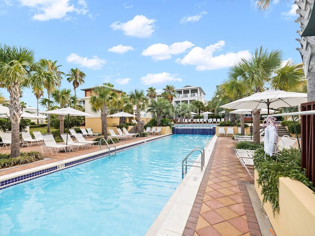 view of swimming pool featuring a patio