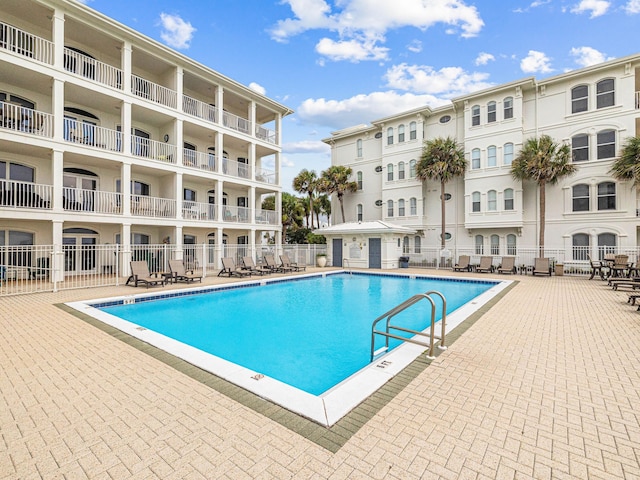 view of pool featuring a patio area