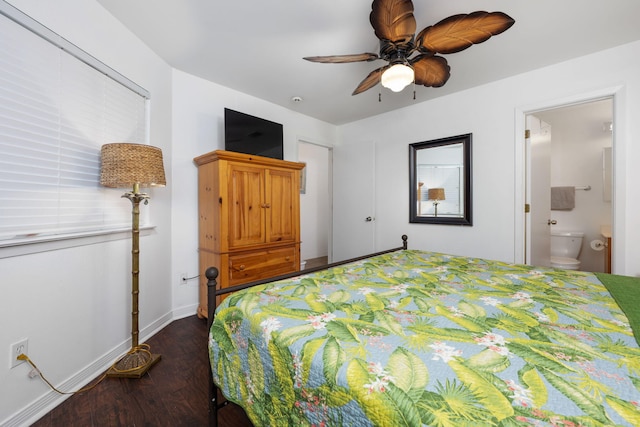 bedroom with dark wood-style floors, ceiling fan, connected bathroom, and baseboards