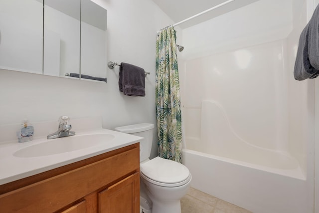 full bath with tile patterned floors, vanity, toilet, and shower / bath combo with shower curtain