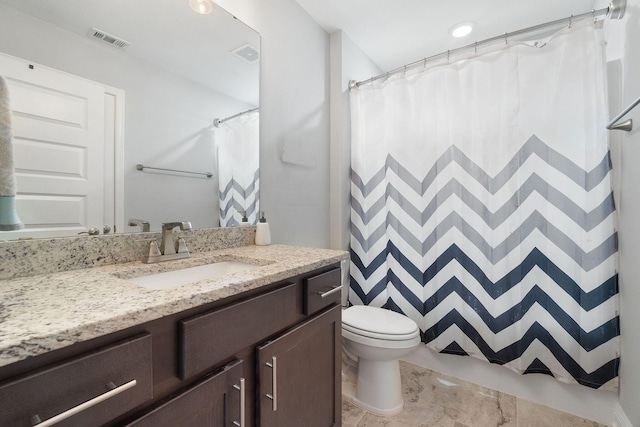 bathroom with toilet, curtained shower, visible vents, and vanity