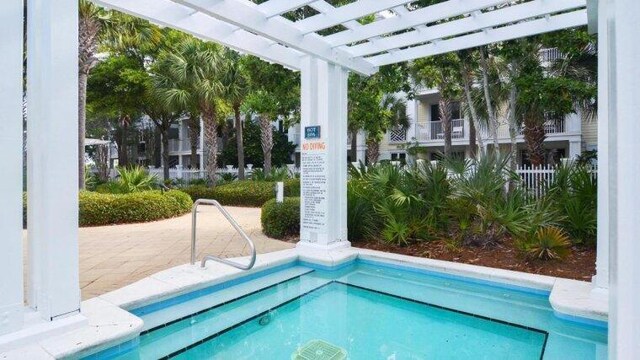 view of pool with a pergola