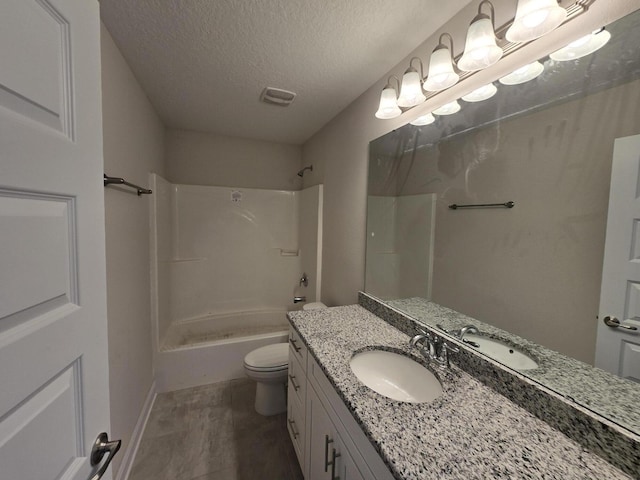 full bathroom with a textured ceiling, toilet, vanity, and shower / bathing tub combination