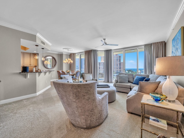 living room featuring baseboards, ornamental molding, and a wealth of natural light