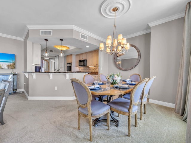 dining room with light carpet, visible vents, and baseboards