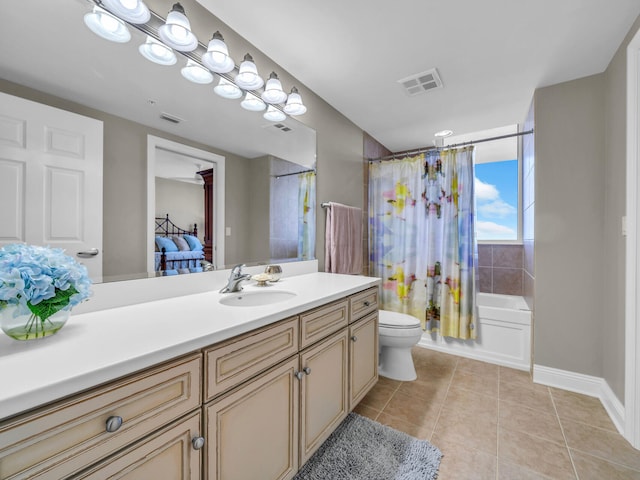 full bathroom featuring toilet, vanity, visible vents, and tile patterned floors