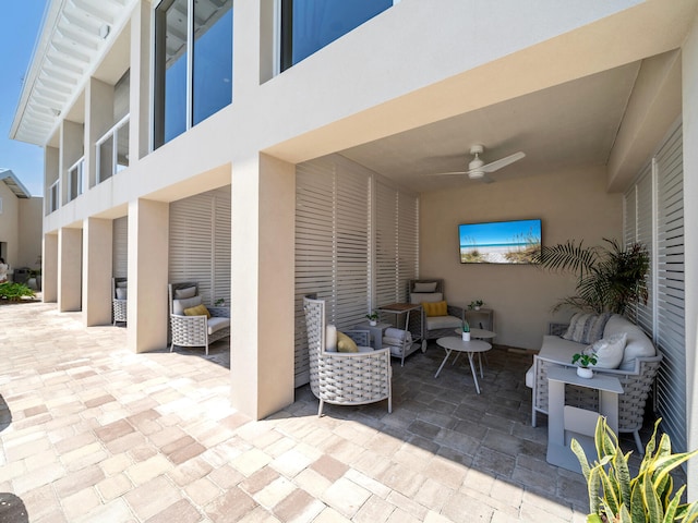 view of patio / terrace with a ceiling fan and outdoor lounge area