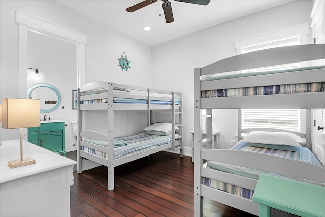 bedroom featuring dark wood-type flooring, ceiling fan, and recessed lighting