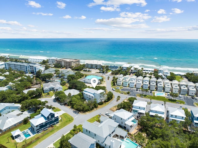 birds eye view of property with a residential view and a water view