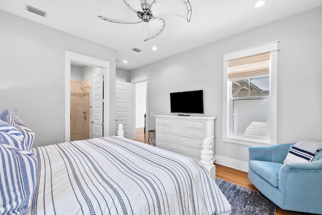 bedroom with recessed lighting, visible vents, a ceiling fan, wood finished floors, and baseboards