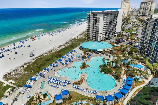 bird's eye view with a beach view and a water view