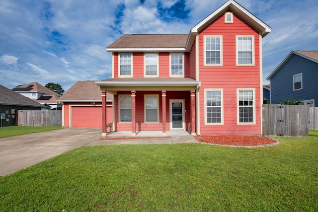 view of front of property featuring covered porch, a garage, and a front lawn