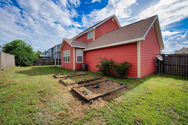 view of home's exterior with a lawn