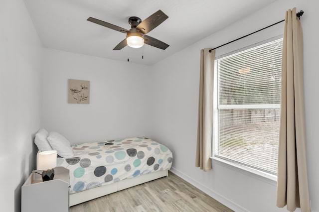 bedroom featuring ceiling fan and light wood-type flooring