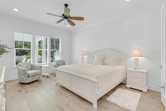 bedroom featuring recessed lighting, baseboards, ceiling fan, and light wood finished floors