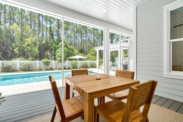 sunroom / solarium with a wealth of natural light