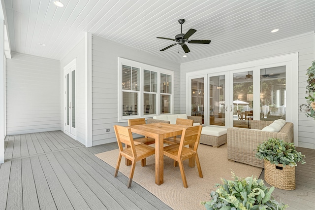 sunroom / solarium with wood ceiling, ceiling fan, and french doors