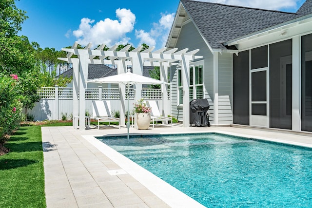 view of swimming pool featuring a fenced in pool, a sunroom, fence, a patio area, and a pergola