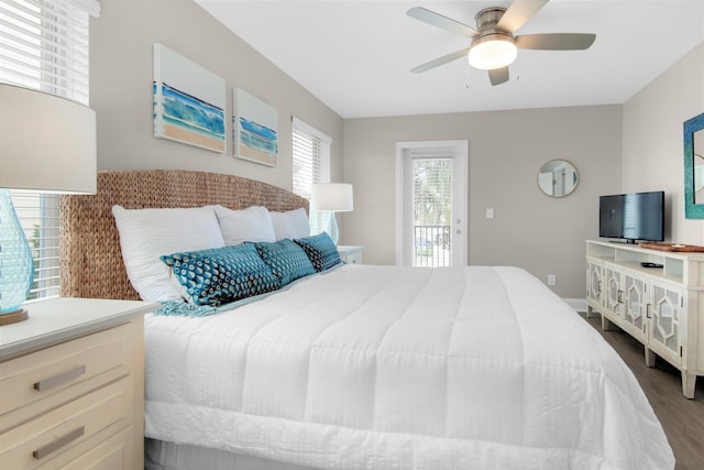 bedroom with ceiling fan, wood finished floors, and access to exterior