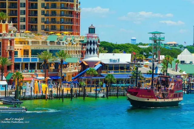 view of jungle gym featuring a water view