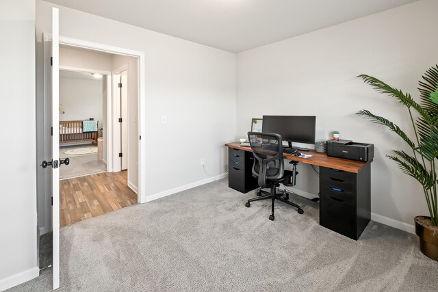 home office with light carpet