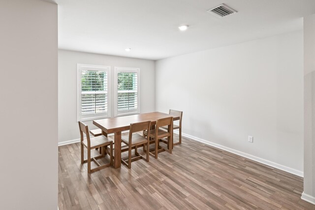 dining room featuring wood-type flooring