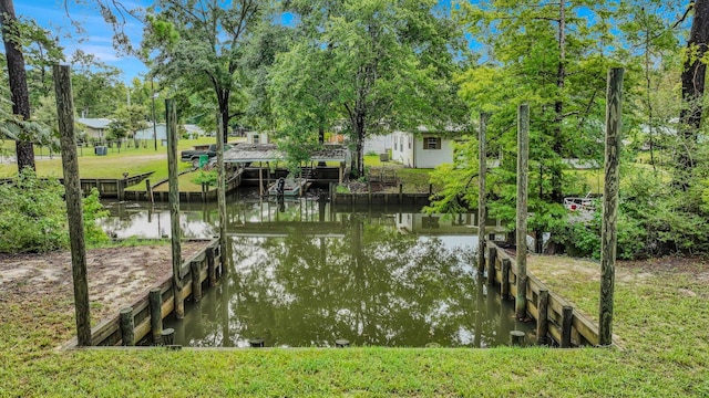 view of dock with a water view