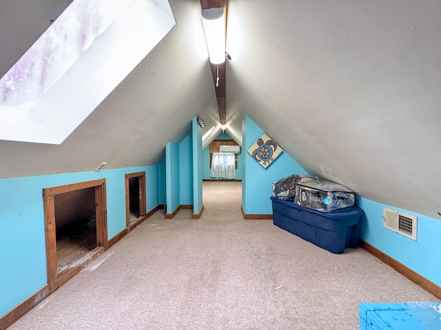 bonus room featuring carpet and lofted ceiling with skylight