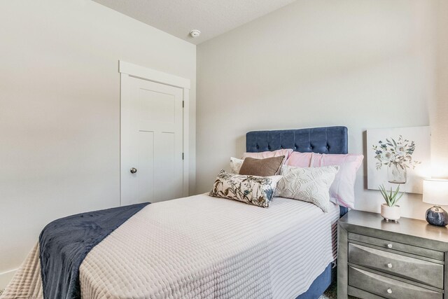 bedroom with a textured ceiling