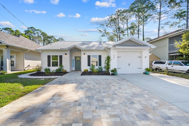 ranch-style house featuring a garage