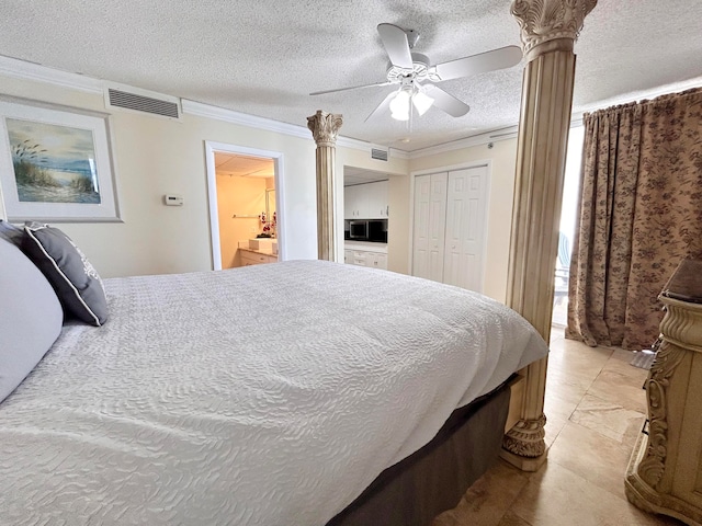 bedroom featuring ceiling fan, a closet, crown molding, and a textured ceiling