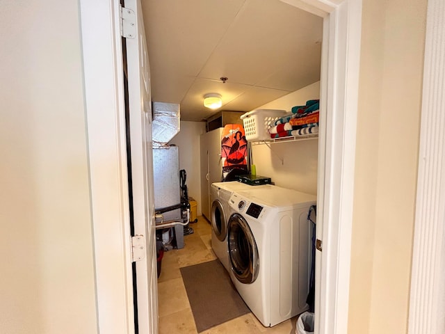 laundry room with washing machine and dryer