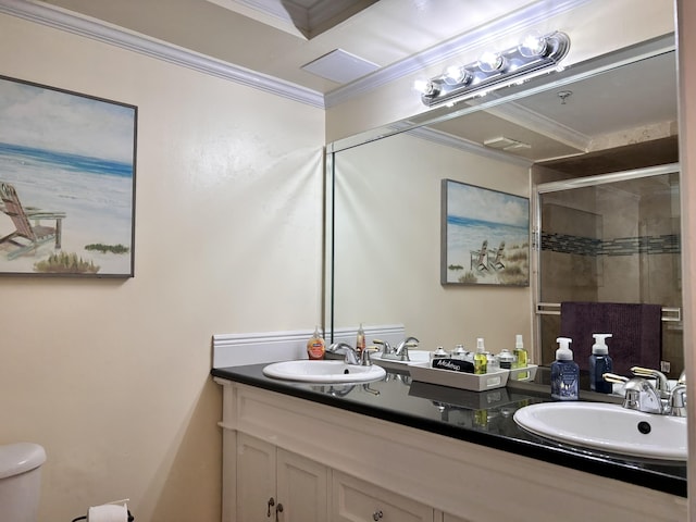 bathroom featuring vanity, ornamental molding, and walk in shower